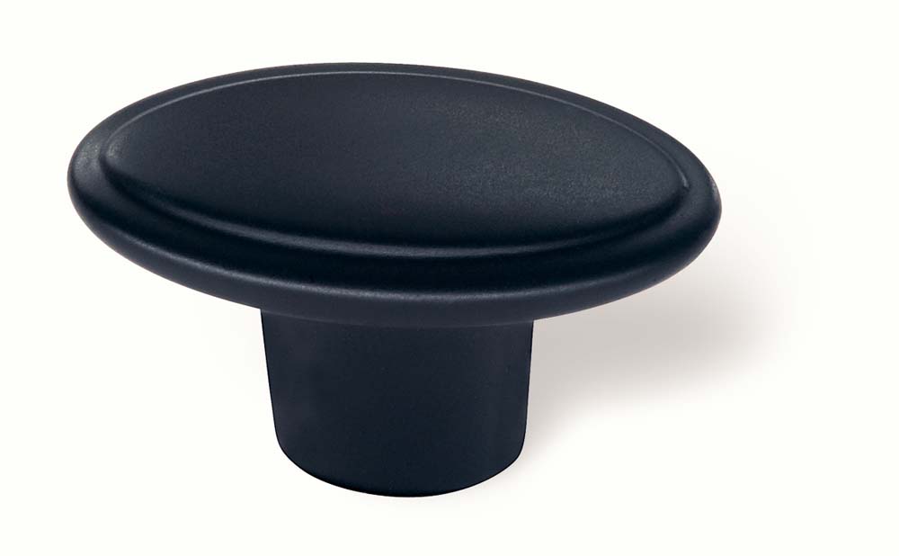 1 x 1/4 small oval knob with inset detail on top. 1/2 deep. Oil